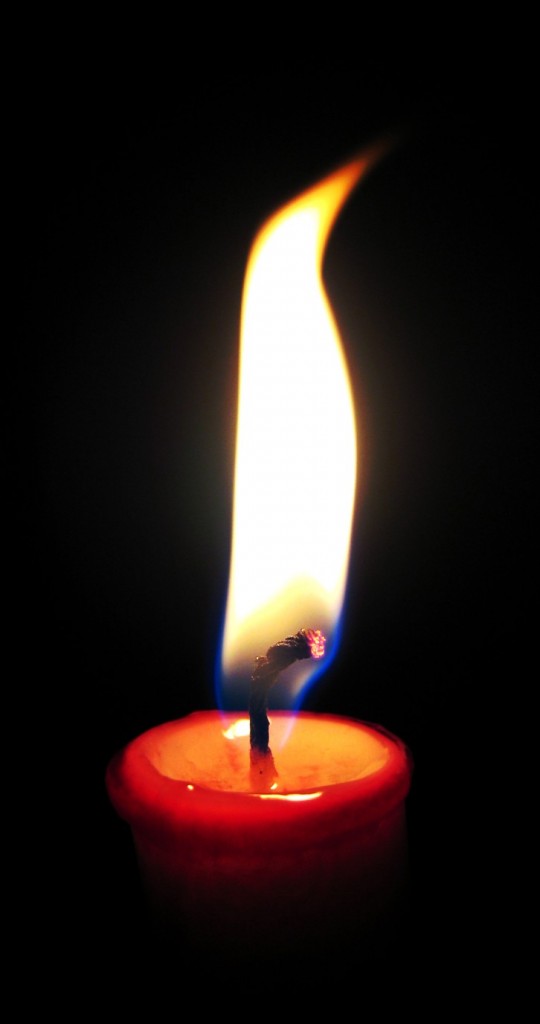 Note the change in color from white to orange to red at the top of the candle flame.  The blue color at the bottom is caused not by blackbody radiation, but by a different process where electrons give off light by undergoing quantum jumps in energy. Source: Matthew Bowden www.digitallyrefreshing.com